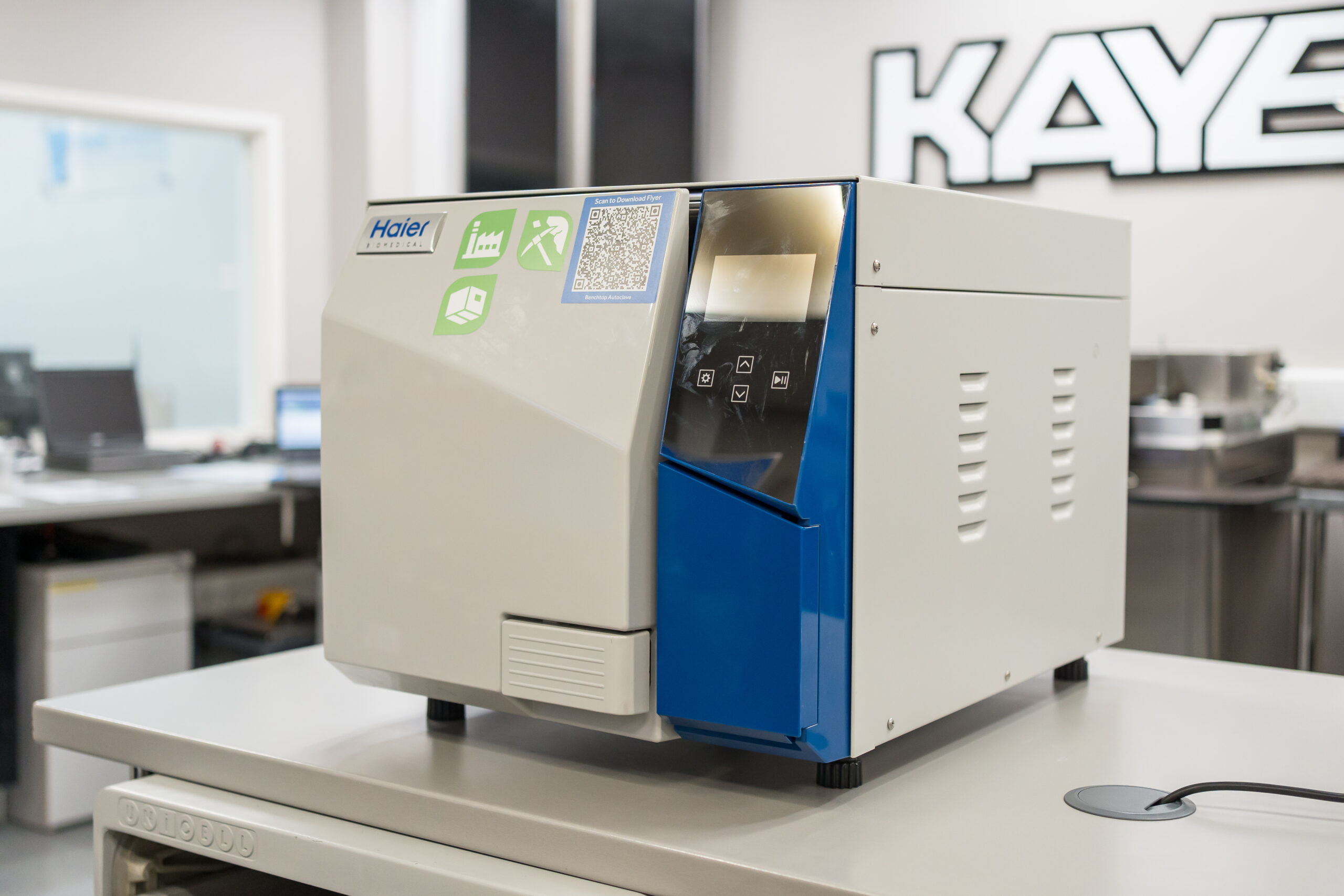 Haier Benchtop Autoclave operating on a benchtop in a lab environment